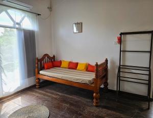 Letto o letti in una camera di Ginger Harmony Guesthouse and Cafe