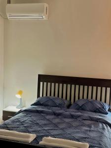 Postel nebo postele na pokoji v ubytování Dekster apartmani