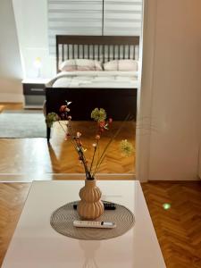 Postel nebo postele na pokoji v ubytování Dekster apartmani