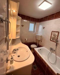 Koupelna v ubytování Dekster apartmani