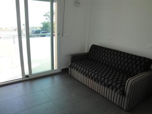 Posezení v ubytování Residence La Nave