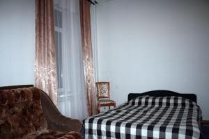 Кровать или кровати в номере Lesogorskaya estate RUUSYAVI