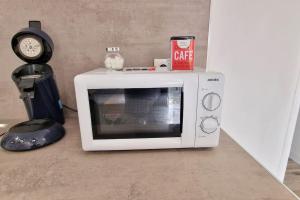 Η κουζίνα ή μικρή κουζίνα στο Maison Aurillac - 2 chambres - parking gratuit