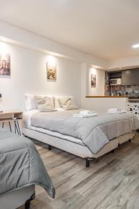 Postel nebo postele na pokoji v ubytování Departamento 3 Paris - Edificio VILAUT by INMOVE Temporarios
