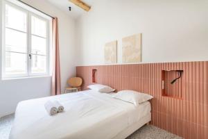 Postel nebo postele na pokoji v ubytování 3CAPU2 - Cosy T2 refait à neuf - Noaille