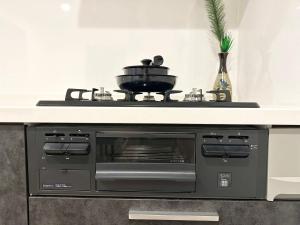 Dapur atau dapur kecil di HSH渋谷Hotel 电车三分钟可以到达新宿 幡ヶ谷 巴士直达涉谷 全新装修独栋小楼