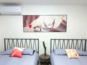 Katil atau katil-katil dalam bilik di HSH渋谷Hotel 电车三分钟可以到达新宿 幡ヶ谷 巴士直达涉谷 全新装修独栋小楼