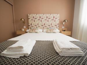 Ένα ή περισσότερα κρεβάτια σε δωμάτιο στο Sanlúcar Urban Apartment