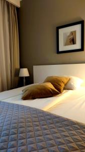 Posteľ alebo postele v izbe v ubytovaní Willa Długa No. 4 Bed & Breakfast