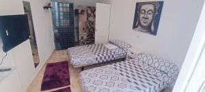 Кровать или кровати в номере Vivienda San Justo