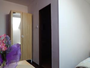 Postel nebo postele na pokoji v ubytování Penzion V Hájku