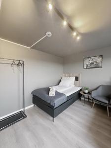 Postel nebo postele na pokoji v ubytování E18rom Motell