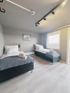 Postel nebo postele na pokoji v ubytování E18rom Motell
