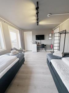 Postel nebo postele na pokoji v ubytování E18rom Motell