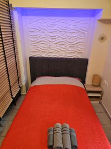 Postel nebo postele na pokoji v ubytování Stylish studio - Your private place in Lamia