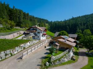 an aerial view of a village with a house at Tholerhof in San Genesio Atesino