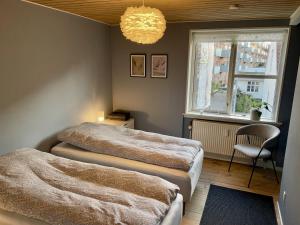 Postel nebo postele na pokoji v ubytování Silkeby Bed & Breakfast
