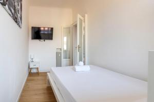 Televízia a/alebo spoločenská miestnosť v ubytovaní Exclusive 3 bedrooms apartment in Brera
