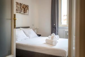 Posteľ alebo postele v izbe v ubytovaní Exclusive 3 bedrooms apartment in Brera