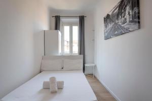 Posteľ alebo postele v izbe v ubytovaní Exclusive 3 bedrooms apartment in Brera