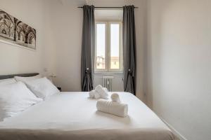 Posteľ alebo postele v izbe v ubytovaní Exclusive 3 bedrooms apartment in Brera