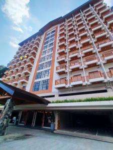a large building with a lot of balconies on it at Northern Vacation Homes - Selendra in Baguio