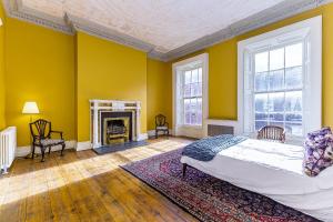 Ένα ή περισσότερα κρεβάτια σε δωμάτιο στο Munster Apartment , 7 Henrietta Street, Dublin City Centre