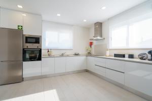 Cuisine ou kitchenette dans l'établissement Villa Lola