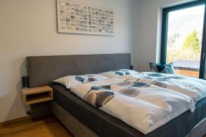 Katil atau katil-katil dalam bilik di Appartement Herzmoar