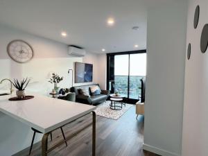 O zonă de relaxare la Box Hill 1BR Apt with Pool,Gym,Sauna l158