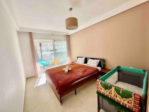 Ένα ή περισσότερα κρεβάτια σε δωμάτιο στο Spacious 2 Bedroom - Terrace & Ocean View +23 φωτογραφίες