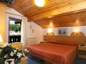 Voodi või voodid majutusasutuse Hotel Adriana toas