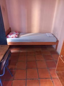 Een bed of bedden in een kamer bij Isla Francia