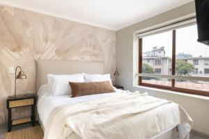 Снимка в галерията на Apt Barrio Turístico Bohemio 3 min Metro, Wifi, AC, Netflik, Comodidad в Сантяго