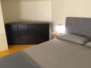 A bed or beds in a room at Duomo House