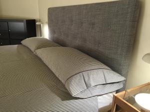 A bed or beds in a room at Duomo House