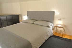 A bed or beds in a room at Duomo House