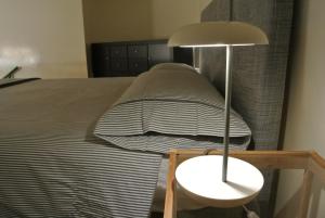 A bed or beds in a room at Duomo House