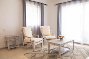 Гостиная зона в Hibiscus Boutique Hotel