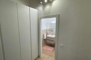 Koupelna v ubytování La Casetta del Faro + 19 fotografií