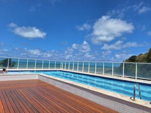 a swimming pool on the deck of a cruise ship at Apartamento BLUE in João Pessoa