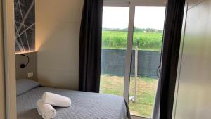 Ein Bett oder Betten in einem Zimmer der Unterkunft Agriturismo La Palazzina