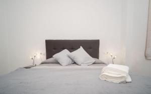 Ein Bett oder Betten in einem Zimmer der Unterkunft Apartamento ateneo