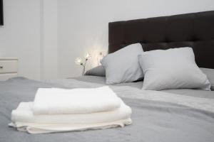 Ein Bett oder Betten in einem Zimmer der Unterkunft Apartamento ateneo