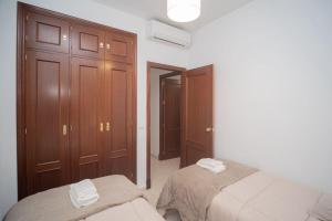 Ein Bett oder Betten in einem Zimmer der Unterkunft Apartamento ateneo