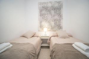 Ein Bett oder Betten in einem Zimmer der Unterkunft Apartamento ateneo
