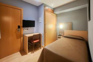 Postel nebo postele na pokoji v ubytování Hotel Faranda Alisas Santander, Ascend Hotel Collection
