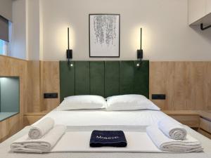 Ένα ή περισσότερα κρεβάτια σε δωμάτιο στο LIV Luxury Mini Penthouse City Center 7A