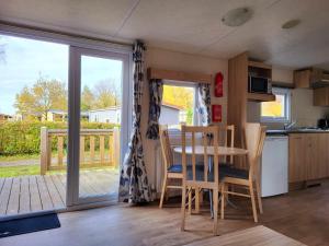 Eldhús eða eldhúskrókur á Strandhuis `Het Kompas`