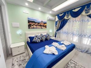 Letto o letti in una camera di La Dolce Casa